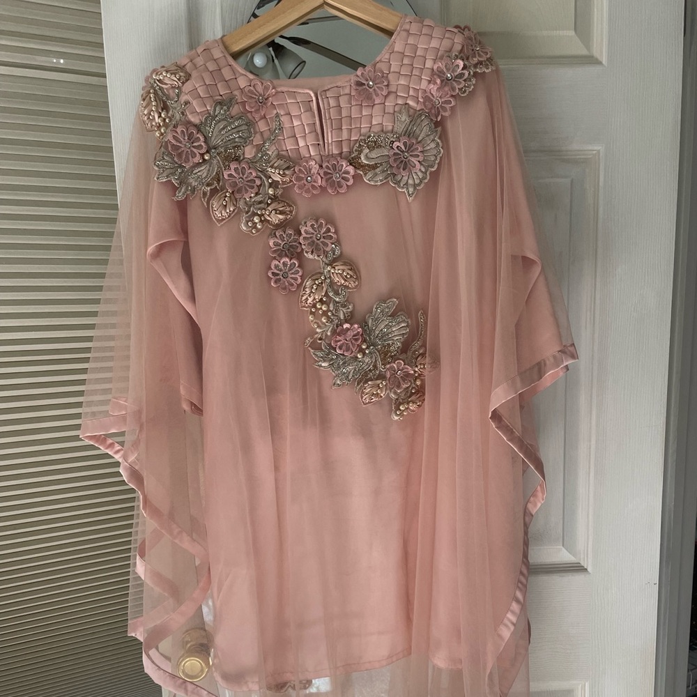 Pakistani party wear with Cutwork and embroidered on front and back.